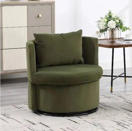 Upholstered bucket-shaped dining chair in olive fabric with ottoman displayed in a modern living room setting.