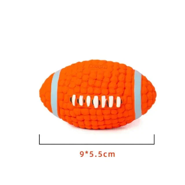 Orange squeaky dog toy in a football shape, designed for interactive play and healthy chewing.
