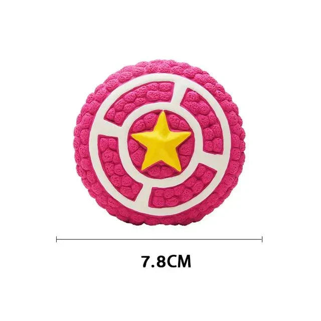 Pink and white round squeaky dog toy with a yellow star design, measuring 7.8 cm.