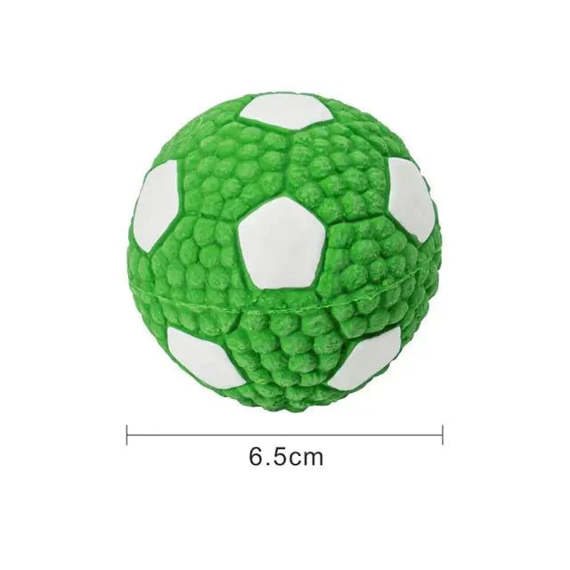 Green squeaky dog toy ball with hexagonal texture, 6.5cm diameter.