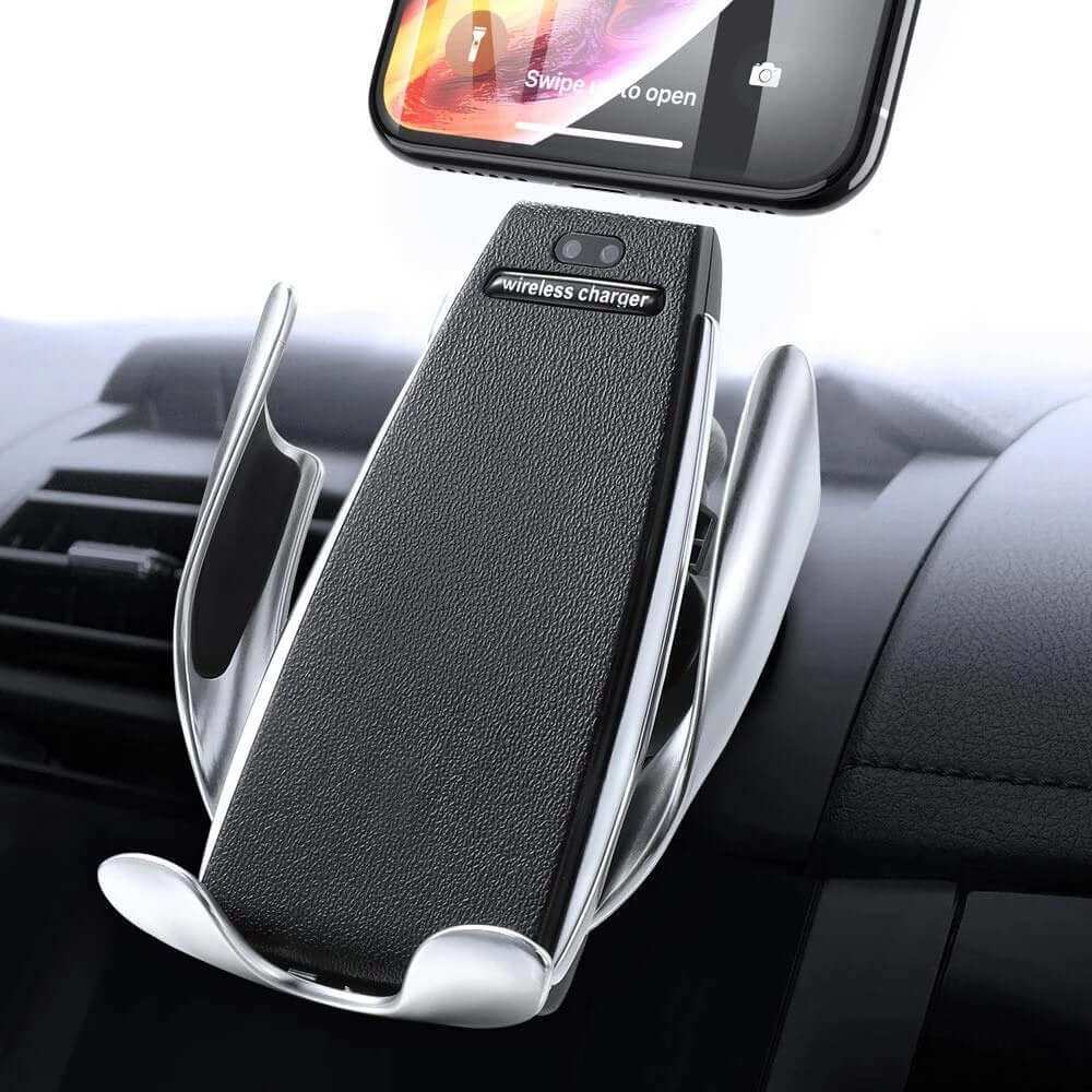 Automatic Clamping Wireless Car Charger mounted on car vent, holding a smartphone.