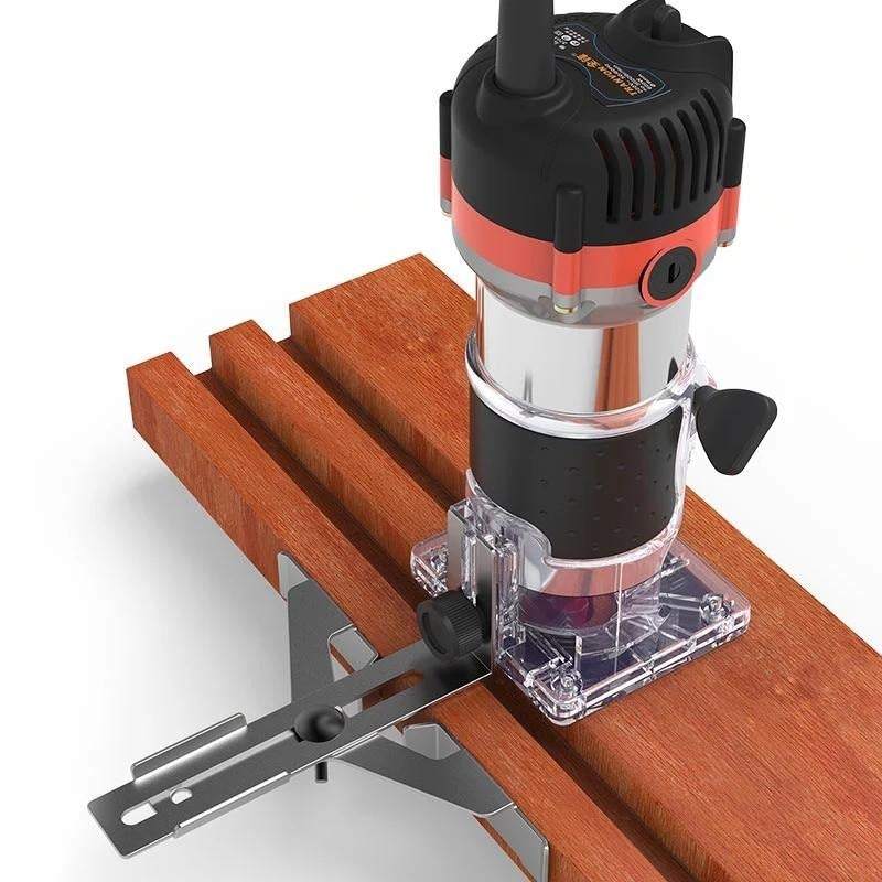Electric laminate edge wood trimmer with adjustable base and transparent view.