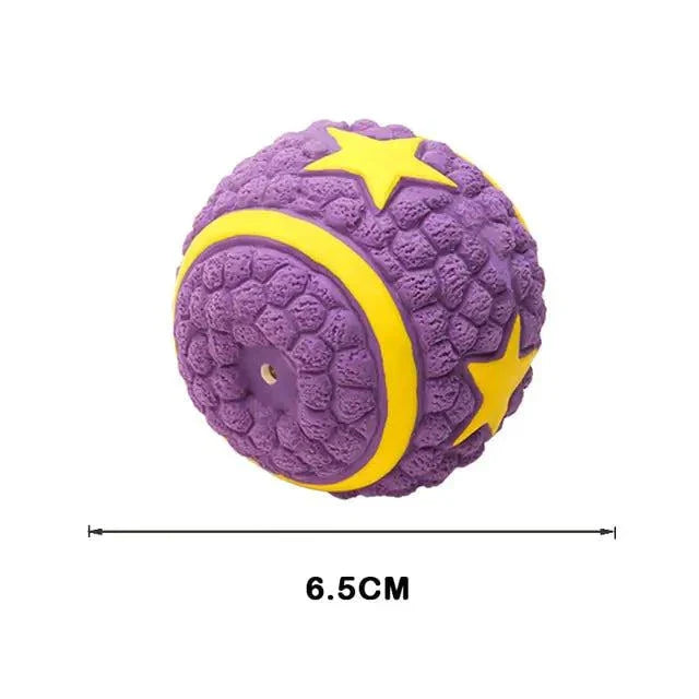 Purple and yellow textured squeaky dog toy ball with stars, 6.5 cm in diameter.