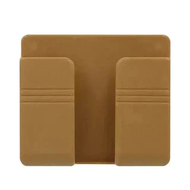 Wall-mounted brown mobile phone holder for convenient storage.