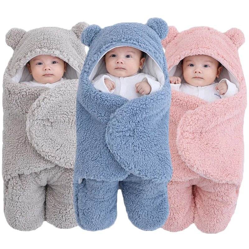 Ultra-soft starfish baby sleeping bag with detachable sleeves in pink, blue, and gray, made of breathable combed cotton.