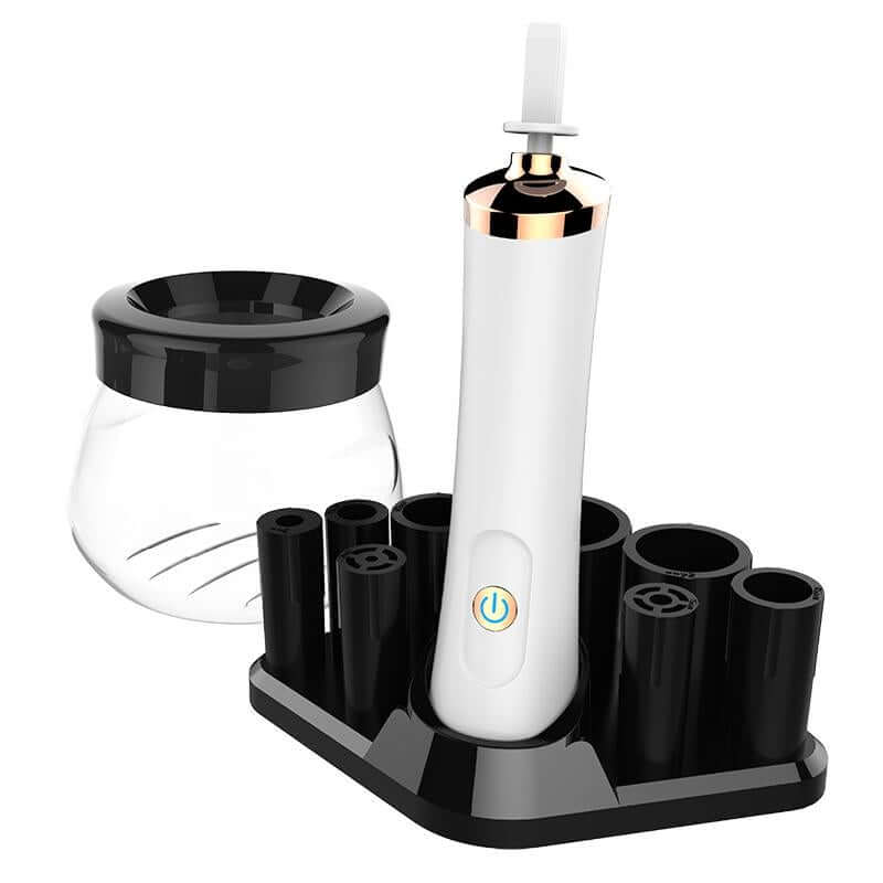 Electric makeup brush cleaning device with white handle, black base, and brush spinner bowl.