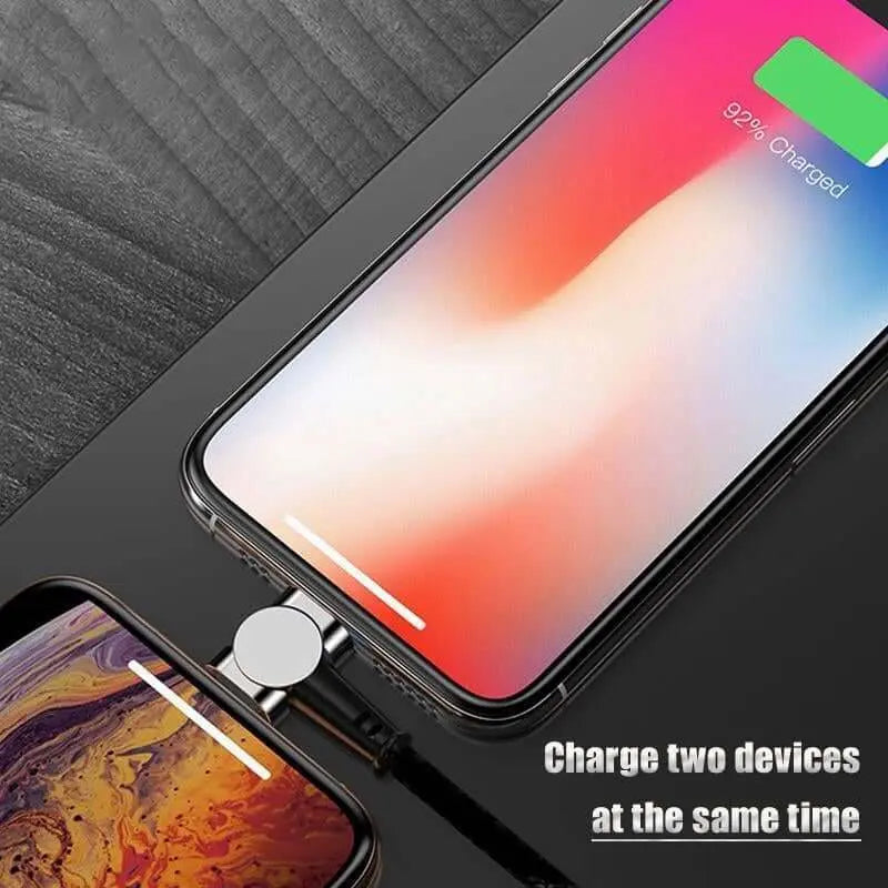 Fast magnetic charging cable connected to two smartphones, showcasing simultaneous charging capability with 92% charge indicator displayed.