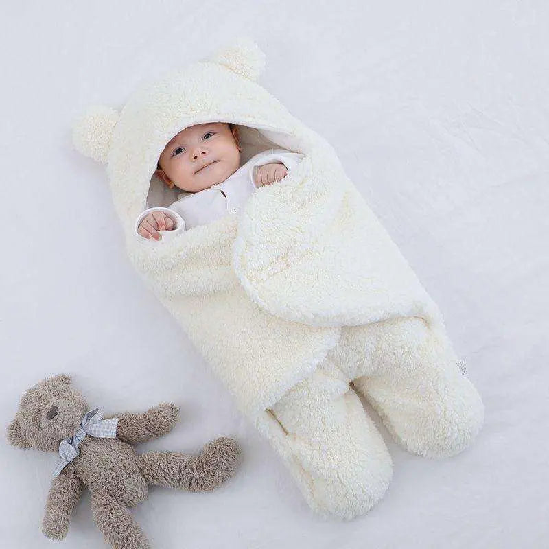 Ultra-soft starfish baby sleeping bag with cozy hood and detachable sleeves, keeping baby warm and comfortable.