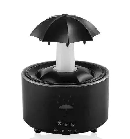 Rotating Aroma Humidifier with remote control, black color, water drop shape, enhances air quality and aromatherapy.