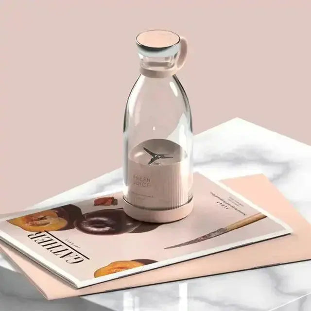 Portable Fresh Fruit Blender on table, showcasing compact design for on-the-go blending.