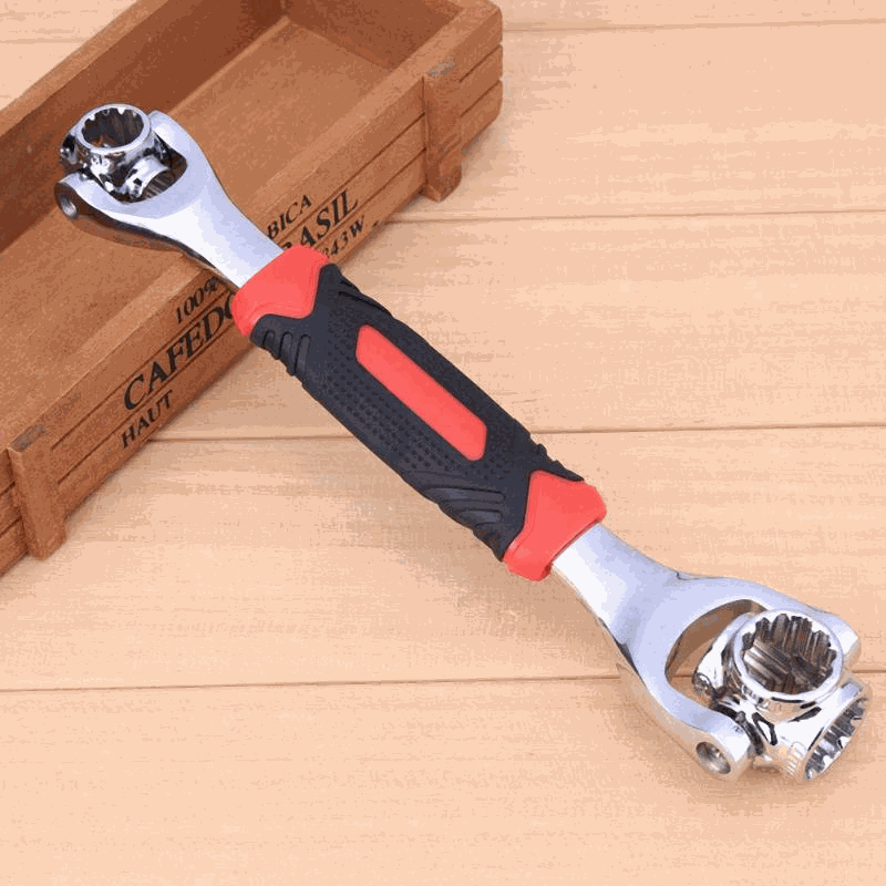 48 in 1 tools socket wrench with swivel head and non-slip grip on wooden surface.